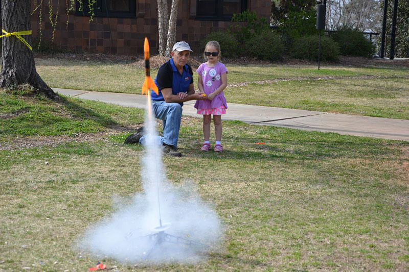 Student launching a rocket