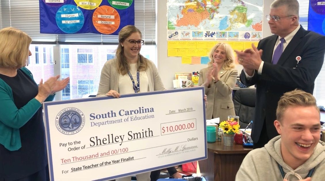Shelley Smith receives check