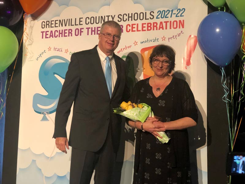 Teacher of the Year Anne Tromsness with District Superintendent Dr. Burke Royster