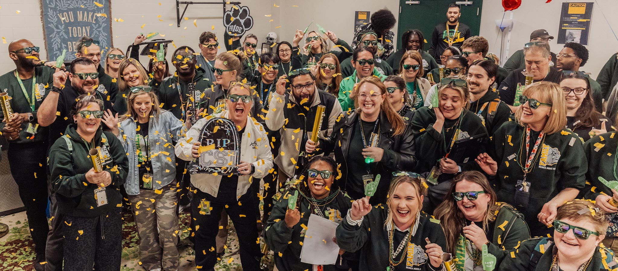 large group of teachers celebrating