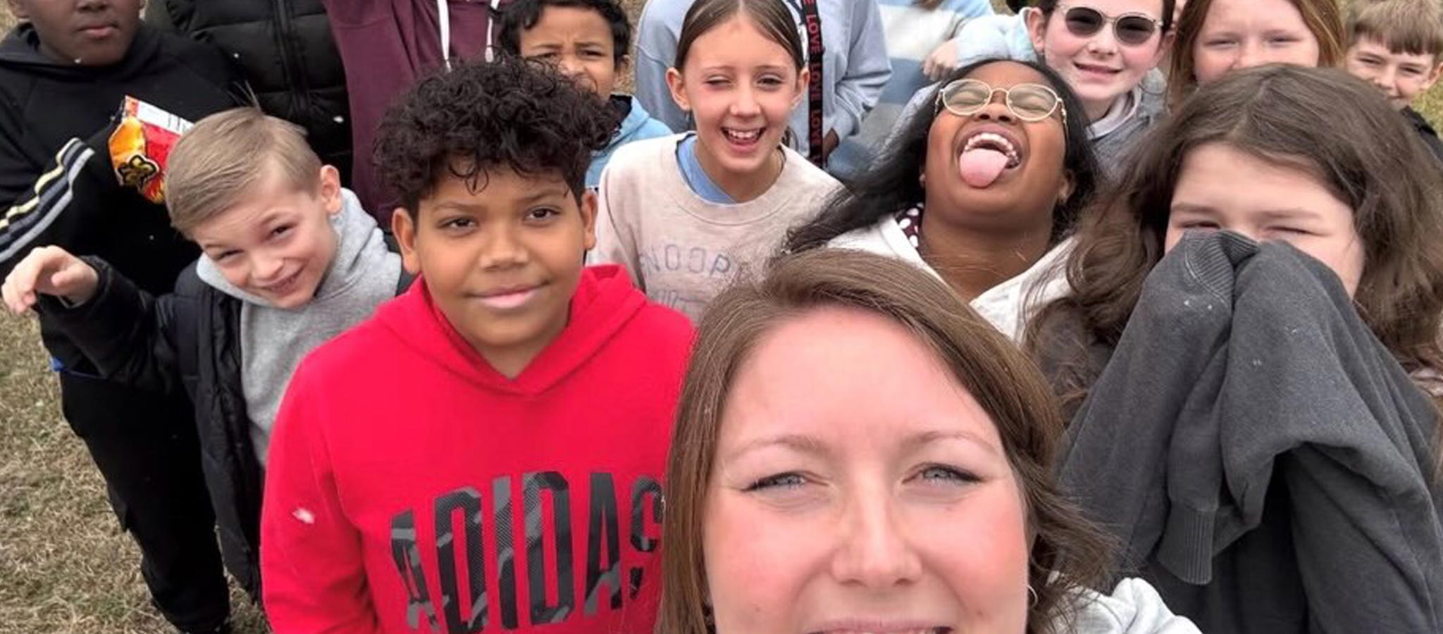 Bethel Teacher selfie with students