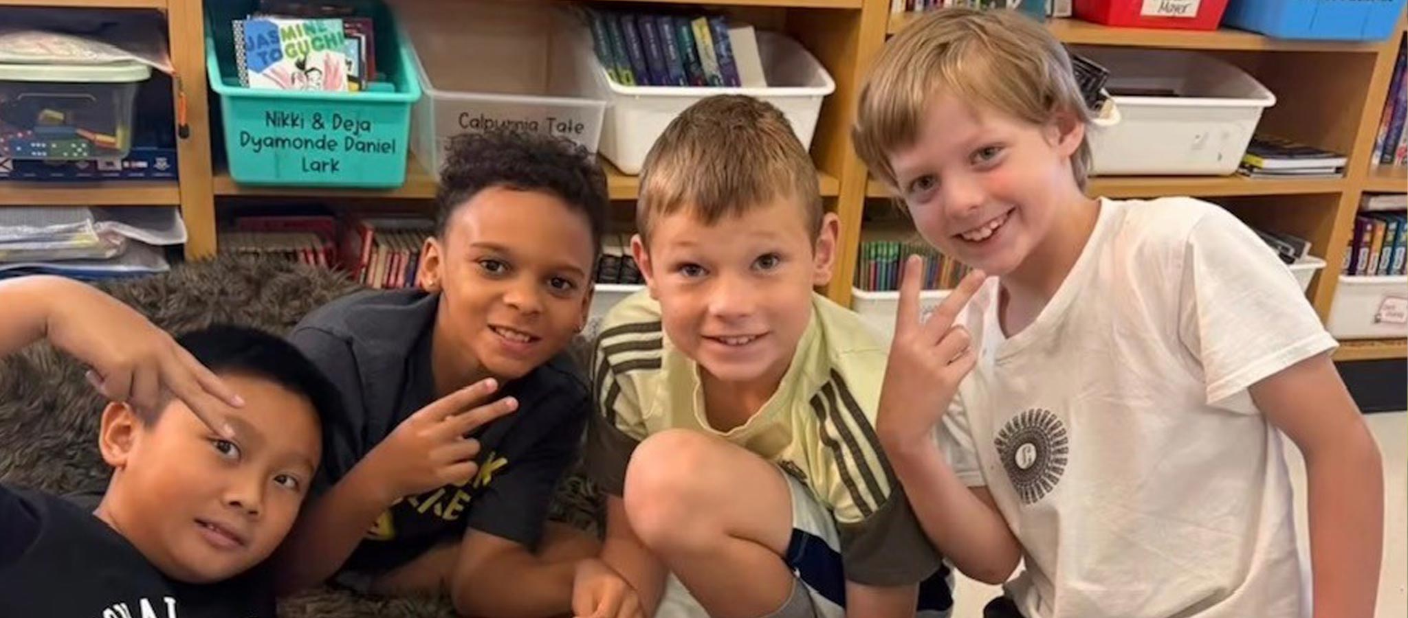 4 boys in the media center