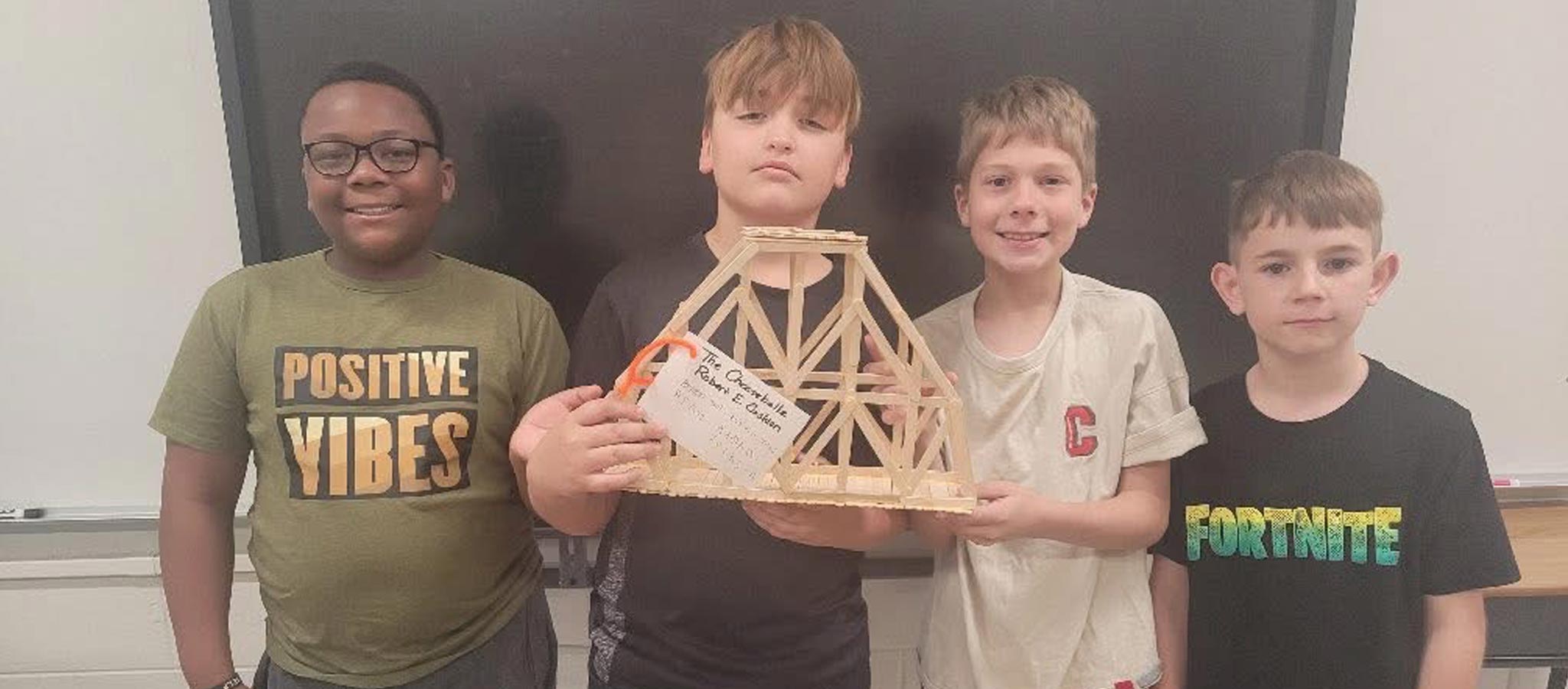 students showing their project