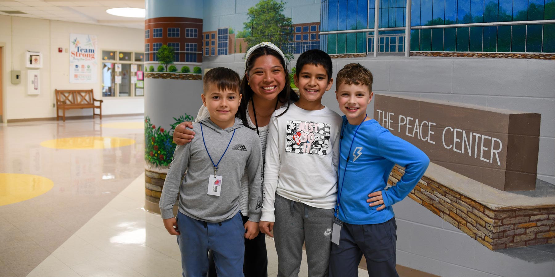 Teacher with 3 elementary boys