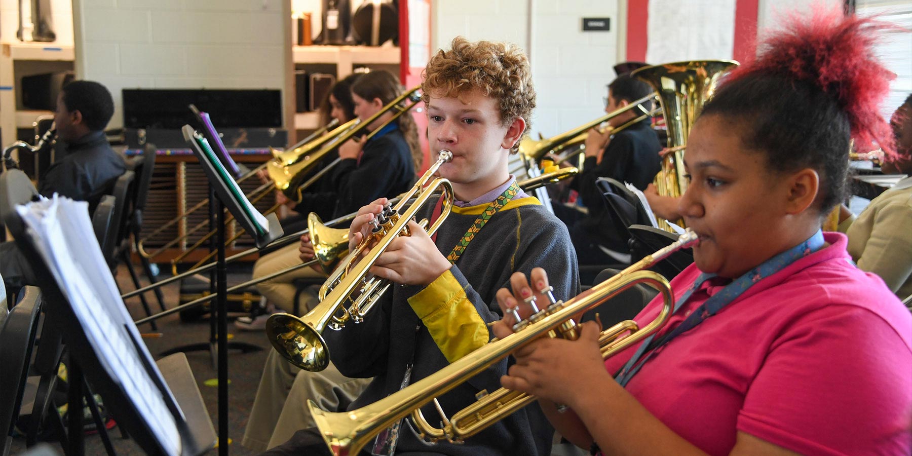 Students playing brass instruments