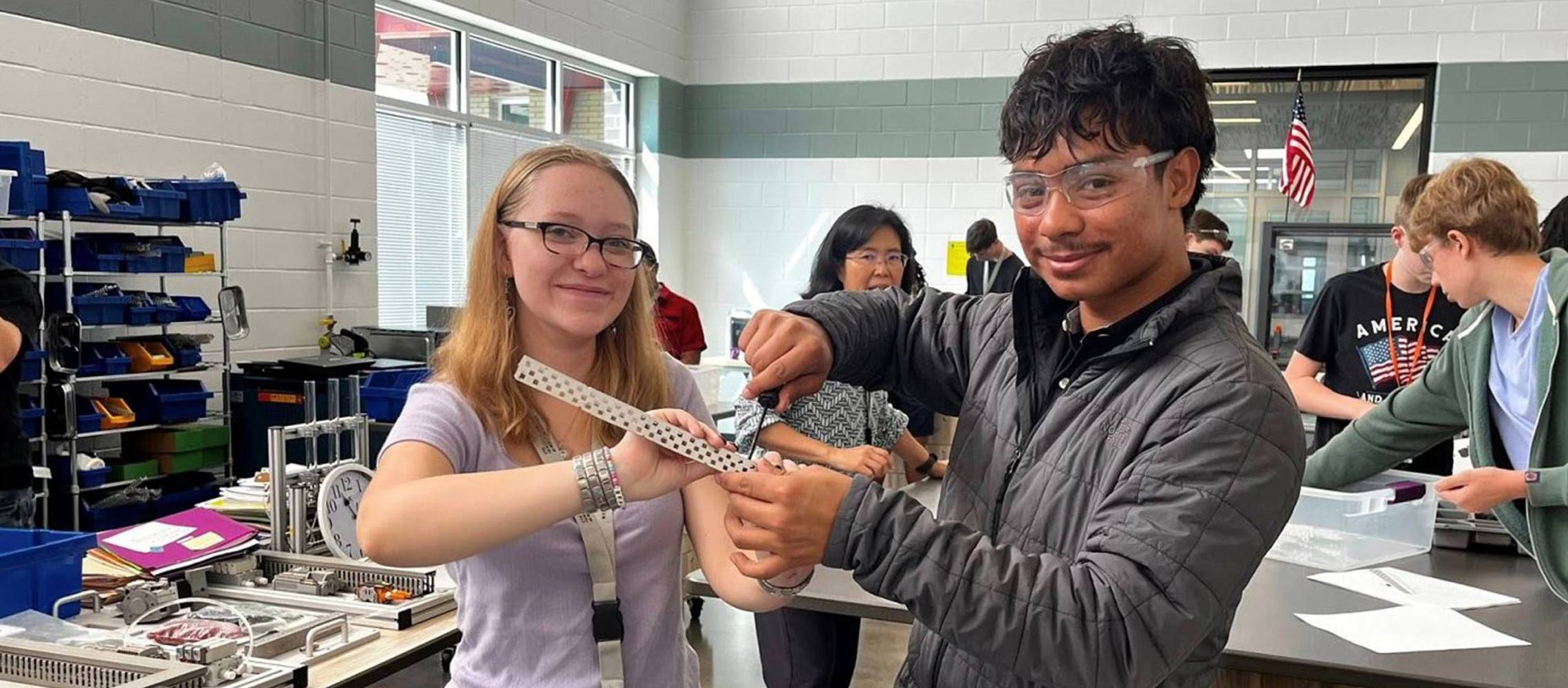 students working with robotics equipment