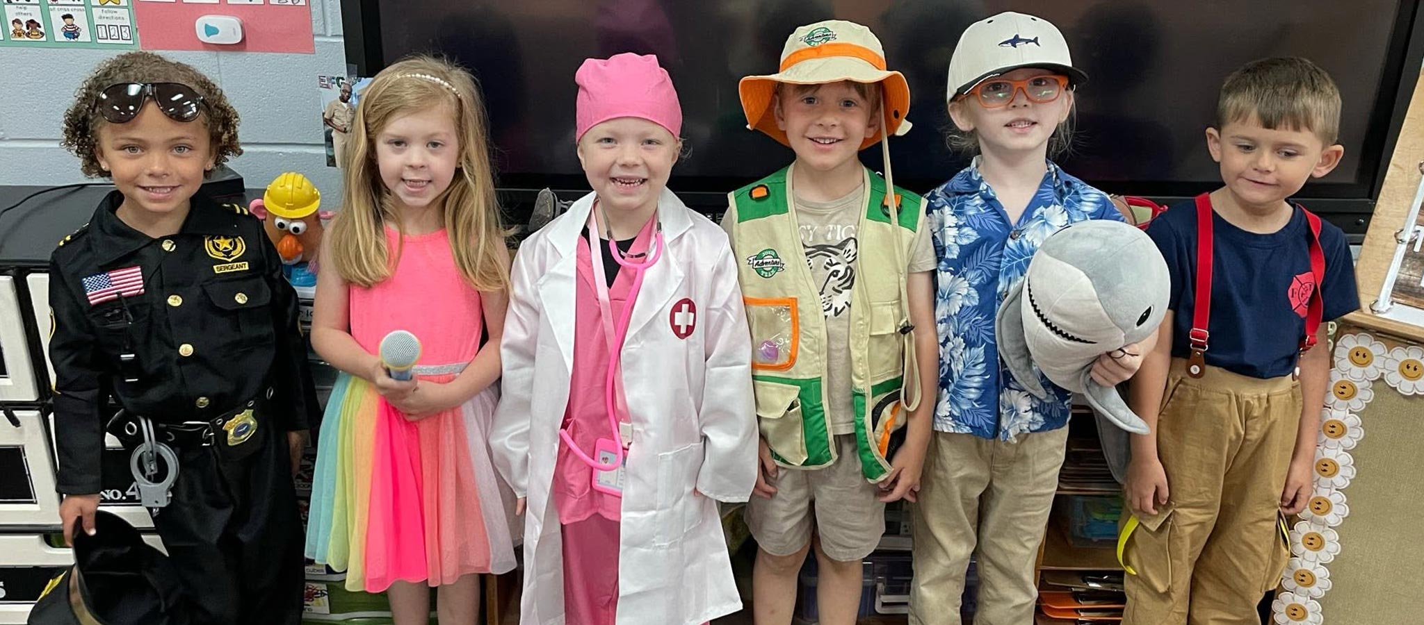 6 elementary students dressed up for Career Day